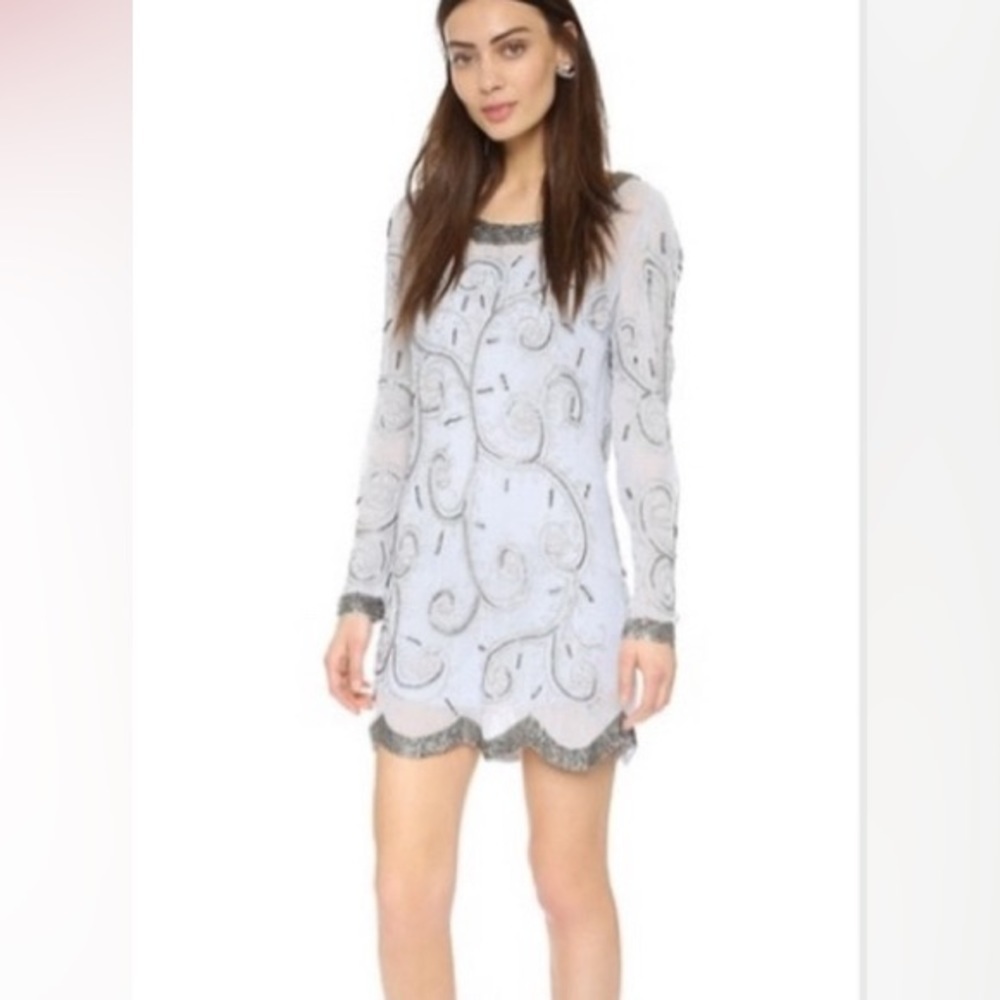 Free People beaded shift dress. NWOT. Size 4. Rare & SOLD OUT ONLINE!